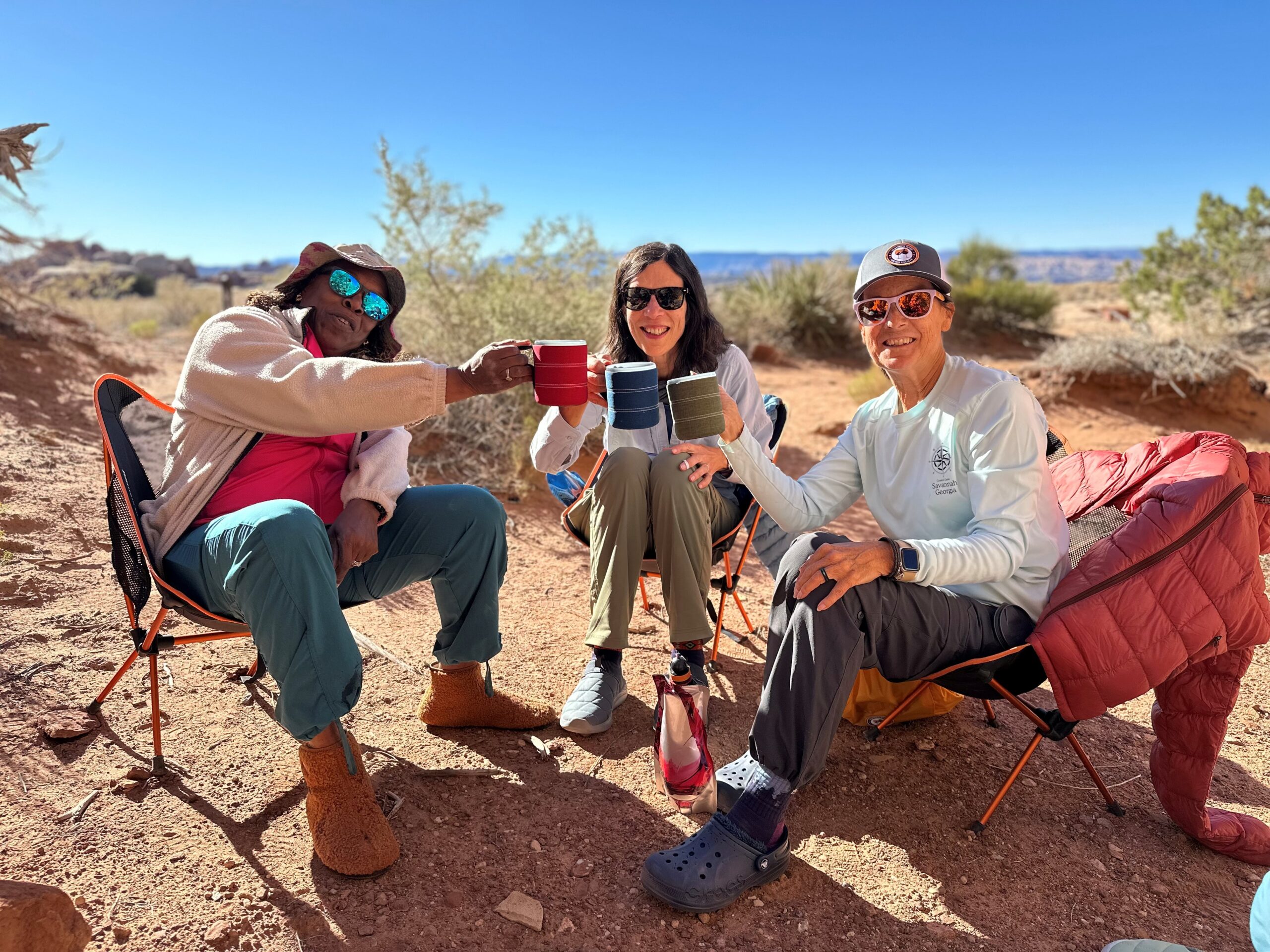 Women sitting in backpacking chairs in Canyonlands National Park