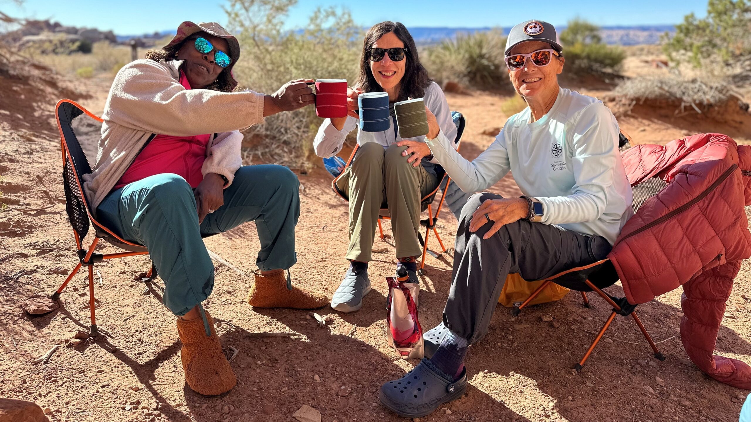 Women sitting in backpacking chairs in Canyonlands National Park